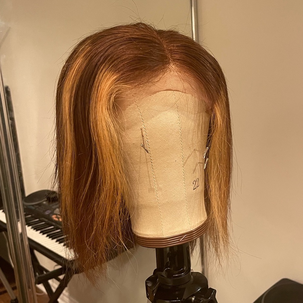 12 in brown wig with blonde highlights